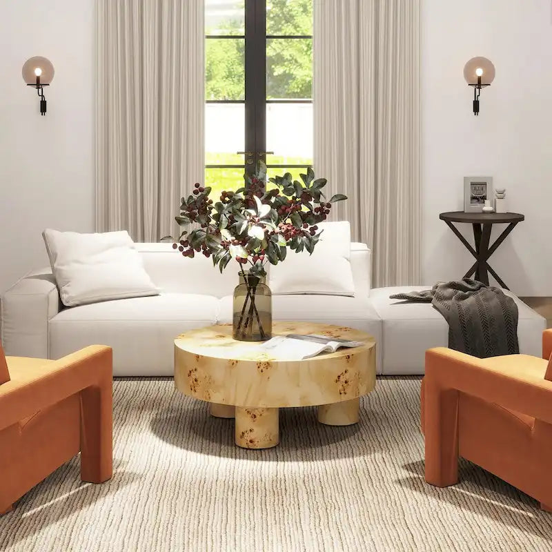 Table basse ronde en loupe avec pieds cylindriques