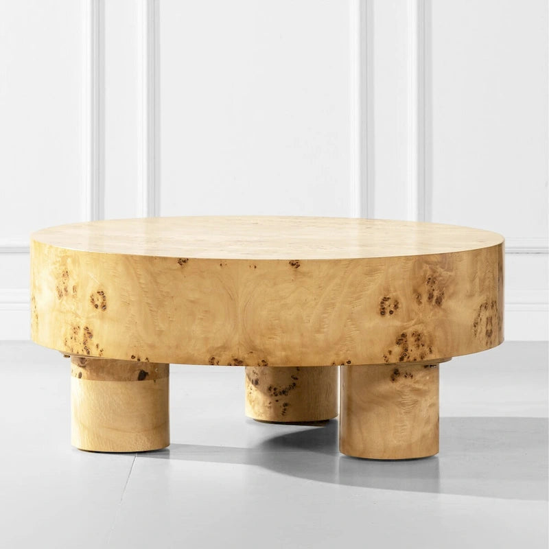 Table basse ronde en loupe avec pieds cylindriques