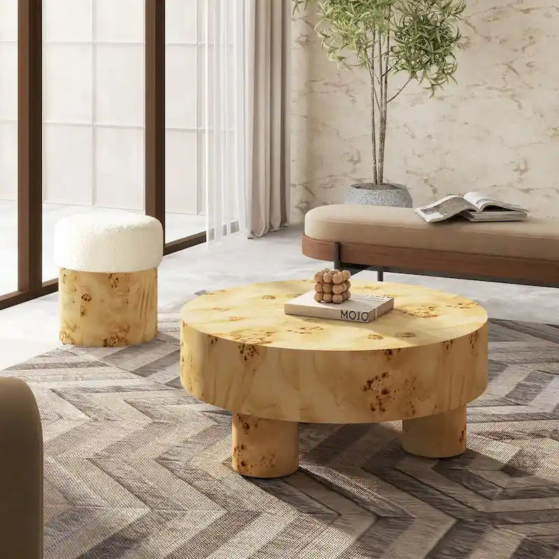 Table basse ronde en loupe avec pieds cylindriques