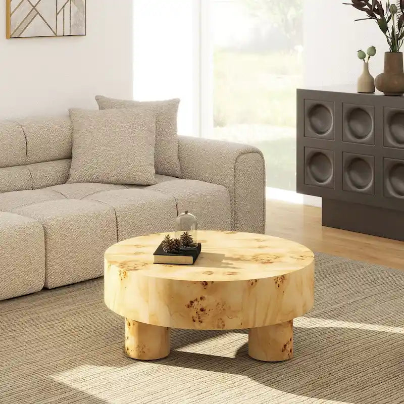 Table basse ronde en loupe avec pieds cylindriques